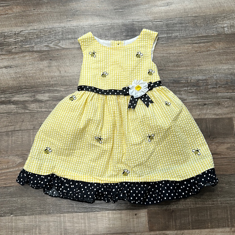 Counting Daisies • yellow and white sear sucker dress with embroidered b…